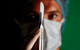 The surgeon is preparing for an operation to increase the limb